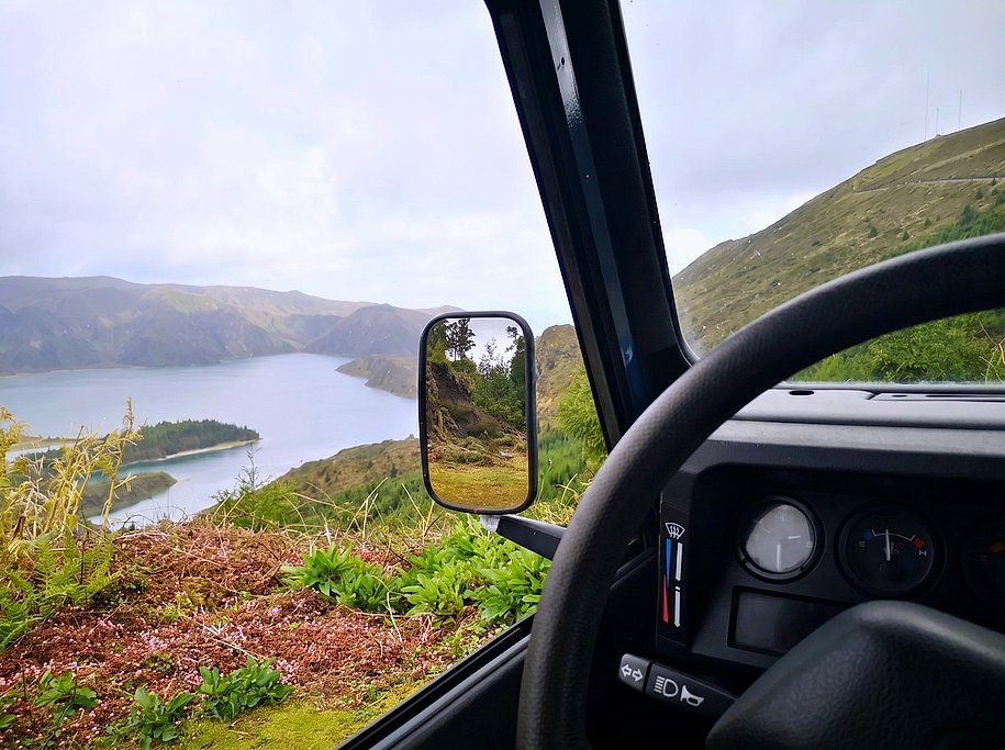 Lagoa do Fogo crater lake seen from inside the jeep, São Miguel